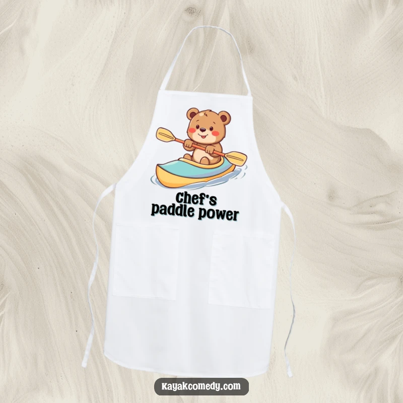 Funny Apron: An excited bear cub paddles a kayak with great enthusiasm, ready for kitchen fun. Perfect gift.