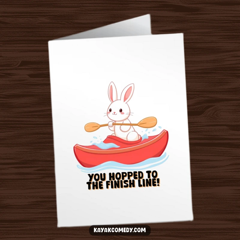 Funny Free Printable Congratulations Card: Playful rabbit steering a bright red kayak through gentle waves, celebrating success.